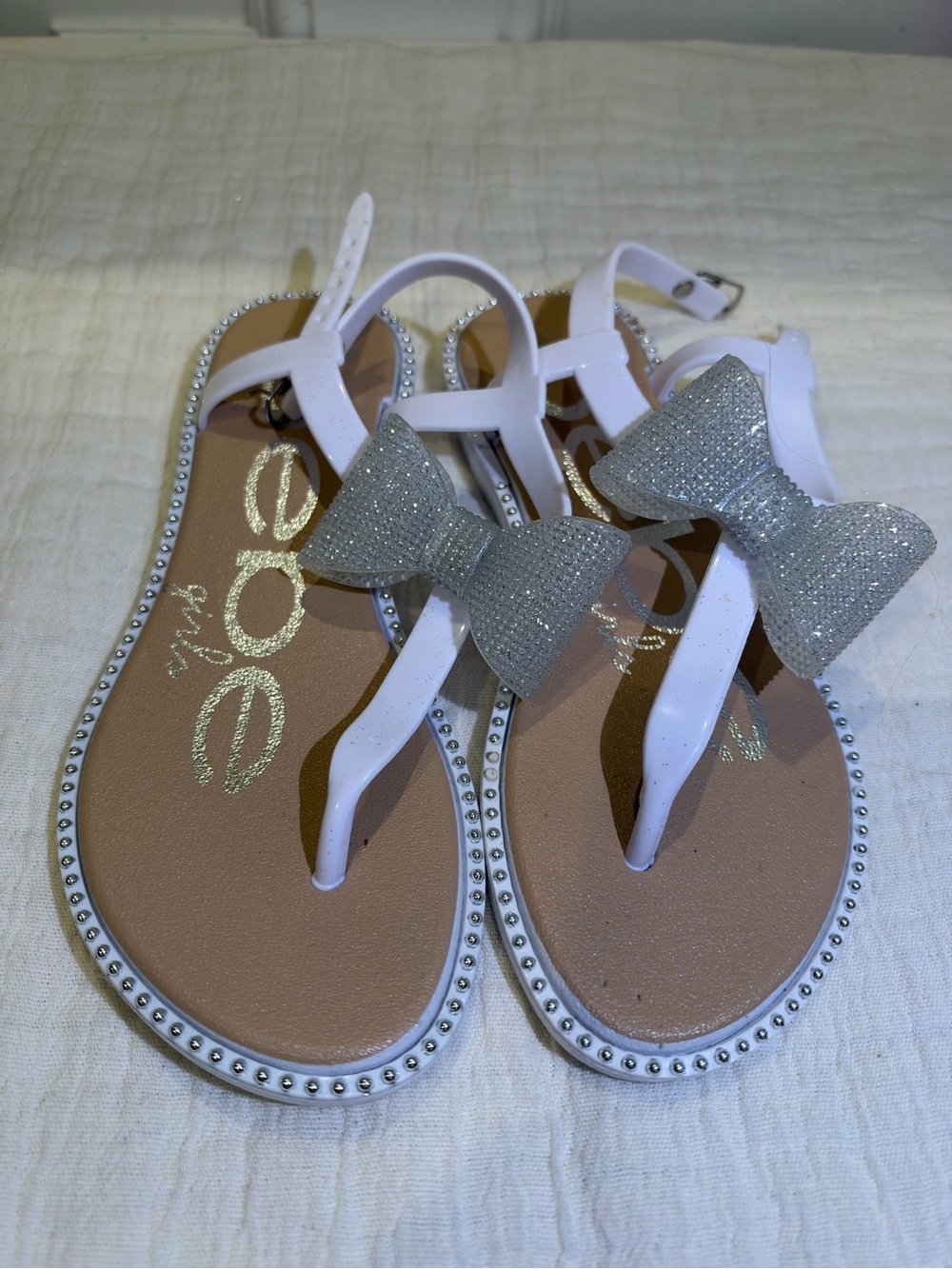 BEBE GIRLS- White Girls' T-Strap Sandals with Silver Glitter Bow